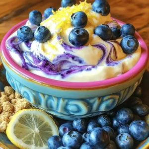 - 1 cup cream cheese, softened to room temperature - 1/2 cup Greek yogurt - 1 cup fresh blueberries These main ingredients form the base of our blueberry lemon cheesecake dip. The cream cheese gives it a rich and creamy texture. Greek yogurt adds a nice tang and helps lighten the dip. Fresh blueberries provide bursts of flavor and a beautiful color. - 1 tablespoon freshly squeezed lemon juice - Zest of 1 lemon (about 1 teaspoon) - 1 teaspoon pure vanilla extract These flavor enhancers make the dip pop. Lemon juice adds a bright, zesty taste. Lemon zest gives a fresh aroma that lifts the dish. Pure vanilla extract rounds out the flavors and adds warmth. - Graham cracker crumbs - Vanilla wafer cookies For serving, I suggest using graham cracker crumbs or vanilla wafer cookies. They add a crunchy contrast to the creamy dip. You can scoop the dip onto the cookies for a fun and tasty treat. To start, you need to soften the cream cheese. Take it out of the fridge and let it sit at room temperature for about 30 minutes. Soft cream cheese mixes better and makes your dip creamy. Next, mix the dip ingredients. In a medium bowl, add the softened cream cheese, Greek yogurt, and powdered sugar. Use an electric mixer on medium speed. Beat the mixture for 2-3 minutes until it is smooth and creamy. Make sure there are no lumps left. Now, add in the lemon juice, lemon zest, and vanilla extract. Mix it all together until everything is well combined. This will give your dip a bright and zesty flavor. Now comes the fun part: folding in the blueberries. Take a spatula and gently fold in the fresh blueberries. Be careful not to mash them. You want some whole berries for tasty bursts in each bite. This step is key for flavor and texture. Make sure the blueberries are evenly distributed throughout the dip. This will help each scoop taste delicious. Next, it’s time to plate the dip. Scoop the cheesecake dip into a serving bowl. Use the spatula to smooth the surface. This makes it look nice and ready for guests. For garnishing tips, top the dip with a few whole blueberries. You can also sprinkle a bit of lemon zest on top for a pop of color. Serving it with graham cracker crumbs or vanilla wafer cookies makes it easy for everyone to enjoy. To get a smooth texture, start with room temperature cream cheese. Cold cream cheese can cause lumps. Mix on medium speed. This keeps everything creamy. Aim for about 2-3 minutes of mixing. Once smooth, add Greek yogurt and powdered sugar. To avoid lumps, make sure to scrape the bowl. This helps blend everything well. If you see lumps, keep mixing until it’s silky. Adjust the sweetness by adding more powdered sugar if needed. Taste as you go. You want a nice balance of sweet and tangy. Using fresh blueberries gives the best flavor. They burst with juice and add a lovely texture. Frozen blueberries work, but they may be mushy. If you use frozen, let them thaw first to reduce extra water. Choose a colorful bowl for serving. A bright bowl makes your dip stand out. It also adds fun to your table. For garnishes, add a few whole blueberries on top. A sprinkle of lemon zest is a nice touch too. You can even place a slice of lemon nearby for extra flair. This makes your dip look fresh and inviting. {{image_4}} You can change up the flavor of your Blueberry Lemon Cheesecake Dip easily. Try adding a splash of orange juice or zest. This adds a sweet citrus twist. You can also mix in other berries like raspberries or strawberries. Each fruit brings a new taste. Just remember to adjust the sugar to match the sweetness of the fruit. Need to swap out cream cheese? Try using dairy-free cream cheese. It works well and keeps the dip creamy. For a lower sugar option, you can use a sugar substitute like stevia or monk fruit. Adjust to your taste. This way, everyone can enjoy the dip without worry. Seasonal fruits can make your dip even better. In summer, add peaches or cherries for a fresh touch. In fall, think about using diced apples or pears. These fruits add flavor and a fun twist. For festive garnish ideas, use mint leaves or edible flowers. They brighten up your dip and make it look special. To keep your blueberry lemon cheesecake dip fresh, store it in an airtight container. This helps keep out extra moisture and air. The dip will last for about 3 to 5 days in the fridge. Before serving, give it a quick stir. This helps bring back the creamy texture. You can freeze the dip for longer storage. To do this, place it in a freezer-safe container. Leave some space at the top for expansion. When you want to enjoy it again, thaw it in the fridge overnight. After thawing, the dip may be a bit watery. Just mix it well to restore the texture. When serving after freezing, pair it with fresh graham crackers or cookies. This makes for a delightful treat that everyone will love. Yes, you can make this dip ahead of time. Store it in the fridge for up to three days. It tastes great cold and stays creamy. Just cover it tightly with plastic wrap or a lid. This dip pairs well with: - Graham cracker crumbs - Vanilla wafer cookies - Fresh fruit slices - Pretzels These options add a nice crunch and contrast to the smooth dip. Yes, you can use frozen blueberries. They may make the dip wetter and slightly change the texture. The flavor will still be delicious, but fresh blueberries add better pops of flavor. To make the dip more tangy, add more lemon juice or lemon zest. You can also use more Greek yogurt. Start with a teaspoon more and taste as you go. Yes, this recipe can be gluten-free. Check the labels on your ingredients. Use gluten-free graham crackers or cookies for serving. Always make sure they are certified gluten-free. This blog post covered how to make a tasty fruit dip. We explored key ingredients like cream cheese, Greek yogurt, and blueberries. You learned how to mix and serve the dip, along with tips for texture and flavor. We also discussed fun variations and storage tips. Creating this dip is simple and fun. Feel free to try different fruits or flavors. Enjoy this treat with family and friends!