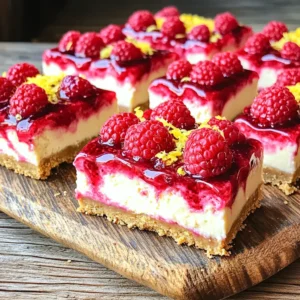 - 1 ½ cups graham cracker crumbs - ½ cup unsalted butter, melted - 2 cups cream cheese, softened - ¾ cup powdered sugar - 1 teaspoon pure vanilla extract - 1 cup heavy whipping cream - 1 cup fresh raspberries, plus a few for garnish - Zest of 1 lemon - Juice of 1 lemon (about 2 tablespoons) - A pinch of salt The main stars of this recipe are the cream cheese, fresh raspberries, and graham cracker crumbs. Cream cheese gives this dessert a rich and creamy texture. Fresh raspberries add a burst of fruity flavor. The graham cracker crumbs create a solid base that holds everything together. - Homemade lemon glaze - Raspberry sauce for serving You can enhance your cheesecake bars with a lemon glaze. This adds a sweet and tangy finish. A drizzle of raspberry sauce creates a lovely color and extra flavor. Try both to see which you like best! - Dairy-free cream cheese - Gluten-free graham crackers If you want a dairy-free option, use dairy-free cream cheese. It works just as well. For a gluten-free version, swap regular graham crackers for gluten-free ones. Enjoy the same great taste with these simple changes! To start, grab a medium mixing bowl. Combine the graham cracker crumbs and melted butter. Stir until the mix looks like wet sand and holds together when squeezed. This texture is key for a good crust. Next, take your crumb mixture and press it firmly into the bottom of a 9x9-inch baking dish. Make sure to spread it evenly. Use a flat-bottomed cup or a spatula to smooth it out. Once it looks even, put the dish in the fridge for about 15 minutes. This helps the crust set up nicely. Now, let’s make the filling. In a large mixing bowl, beat the softened cream cheese using an electric mixer. Mix on medium speed for about 2-3 minutes. You want it completely smooth and creamy. Gradually add the powdered sugar, vanilla extract, lemon zest, and lemon juice to the cream cheese. Mix on low speed until everything is well blended and creamy. This filling is where the magic happens. In a separate bowl, pour in the heavy whipping cream. Use an electric mixer on high speed to whip the cream until stiff peaks form. This can take around 4-5 minutes, so keep an eye on it. Then, carefully fold the whipped cream into the cream cheese mix. Start with a third of the whipped cream to lighten the mixture. Gently fold in the rest until it’s smooth and fluffy. Be careful not to deflate the whipped cream. Now, gently fold in the fresh raspberries. Try not to break them too much. Save a few whole raspberries to garnish later. Pour the cheesecake mixture over the chilled crust. Use a spatula to smooth the top evenly. Finally, cover the dish tightly with plastic wrap and refrigerate for at least 4 hours. This will let the cheesecake set and firm up perfectly. How do you whip cream to the right consistency? To get the perfect whipped cream, start with cold heavy cream. Pour it into a mixing bowl. Use an electric mixer on high speed. Whip for about 4 to 5 minutes. You'll know it's ready when stiff peaks form. This means the peaks hold their shape when you lift the mixer. How do you fold without deflating whipped cream? Folding whipped cream into your mixture is all about being gentle. Start by adding a third of the whipped cream to the cream cheese mix. Use a spatula to cut down the center and lift it. Turn the bowl slightly as you fold. Add the rest of the whipped cream in batches. This keeps the mixture light and fluffy. What are some presentation ideas for a visually appealing dish? Serve the cheesecake bars on a colorful platter. For a pop of color, drizzle homemade lemon glaze or raspberry sauce on top. Add fresh raspberries around the bars for a fun touch. You could also sprinkle some lemon zest for a bright look. What are some ideas for garnishes or additional toppings? Top the cheesecake bars with more fresh raspberries. You can also use a dollop of whipped cream. A light dusting of powdered sugar adds a sweet note. These simple touches make the bars look even more delicious. What should you do if the filling is too runny? If your filling is too runny, it may need more whipping. Make sure your cream cheese is soft but not too warm. If it's too soft, it can lead to a runny mixture. You can also chill the mixture for a bit to help it set. What are some tips for cutting clean slices? To cut clean slices, use a sharp knife. Dip the knife in hot water and wipe it dry before cutting. This helps the knife glide through without squishing the bars. Clean the knife after each cut for the best results. {{image_4}} You can change the taste of your cheesecake bars by using different fruits. Strawberries and blueberries are great choices. They add a sweet and vibrant twist to the dish. You can also try other citrus flavors. Lime and orange zest will give your bars a fresh kick. Just remember, the key is to balance the sweetness with the acidity. Scaling the recipe is simple. If you want more bars, just double the ingredients. For fewer servings, cut the ingredients in half. The crust thickness is another area to adjust. A thicker crust will give a crunchier base, while a thinner crust will let the filling shine. Keep this in mind when you plan your dessert. You can easily make a vegan version of these bars. Use dairy-free cream cheese and coconut cream instead of heavy whipping cream. For low-sugar options, substitute powdered sugar with a sugar-free alternative. This way, everyone can enjoy a delicious treat, no matter their dietary needs. To keep your no bake raspberry lemon cheesecake bars fresh, store them in the refrigerator. Use an airtight container to prevent any odors from other foods. If you do not have one, wrap the bars tightly in plastic wrap. This keeps them safe and tasty. If you want to freeze these bars, cut them into squares first. Place the squares in a single layer on a baking sheet. Freeze them for about 1 hour. Once they are firm, move them to a freezer-safe container or zip-top bag. This method helps avoid freezer burn. In the refrigerator, your cheesecake bars will stay fresh for about five days. Make sure to keep them covered. If you freeze them, they will last about two months. For the best taste, eat them sooner rather than later. These cheesecake bars are best served cold. If you took some out of the freezer, let them thaw in the fridge overnight. This keeps their soft texture. Avoid using a microwave, as it can make them soggy. Enjoy them chilled for the perfect treat! Yes, you can use frozen raspberries. Just make sure to thaw them first. Drain any extra juice to avoid a soggy filling. Frozen raspberries work well and still give great flavor. They may be softer than fresh ones, so handle them gently. This helps keep the nice texture in your cheesecake bars. You need to chill these bars for at least four hours. This time lets the filling set properly. If you can wait longer, that’s even better! Chilling overnight improves the flavor and texture. Just cover the dish tightly with plastic wrap to keep it fresh. For clean slices, use a sharp knife. Dip the knife in hot water, then wipe it dry before slicing. This method helps to prevent sticking. Cut the bars slowly and gently. You can also run the knife under warm water between cuts for even better results. This keeps your bars looking nice and neat. This blog post covered how to make raspberry lemon cheesecake bars. You learned about the key ingredients, how to prepare each layer, and tips for perfect texture. We explored variations, storage, and common questions. Now, you can create your own delicious dessert. Enjoy experimenting with flavors and presentations. This recipe brings joy and sweetness to any occasion. Happy baking!