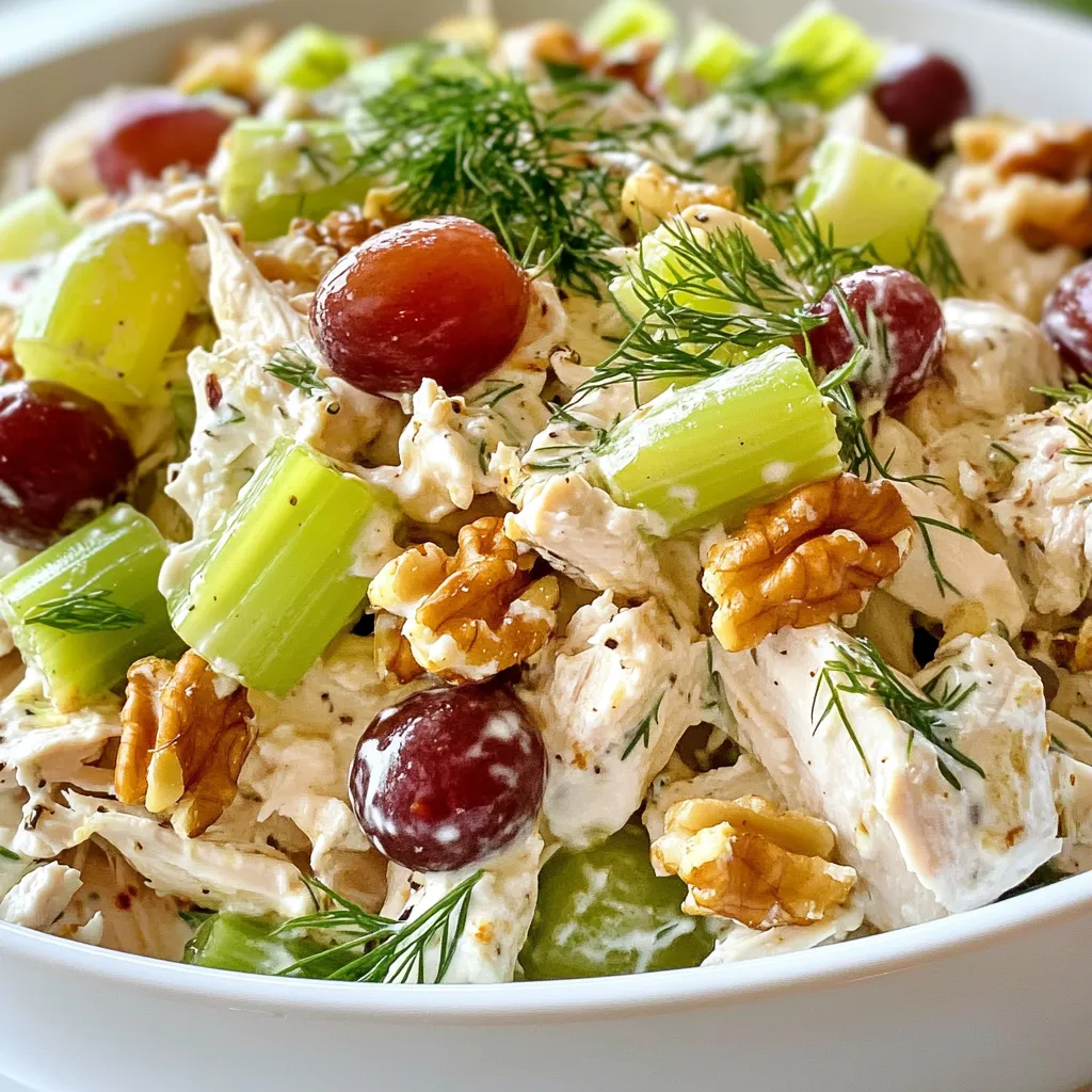 For this Greek Yogurt Chicken Salad, you need a few simple ingredients. Each one adds flavor and texture. Here’s what you’ll need: - Chicken: Use 2 cups of cooked chicken breast. Shred it to bite-sized pieces. - Greek Yogurt: One cup of plain Greek yogurt gives a creamy base. - Vegetables and Fruits: You need ½ cup finely chopped celery and ½ cup red grapes, halved. They add crunch and sweetness. - Nuts and Herbs: Add ¼ cup chopped walnuts for crunch and 2 tablespoons fresh dill for fresh flavor. - Seasonings: Use 1 tablespoon Dijon mustard, 1 tablespoon honey, 1 tablespoon lemon juice, and salt and pepper to taste. These bring all the flavors together. These ingredients blend well for a tasty and healthy meal. Each item plays a role in making this salad both fresh and simple. {{ingredient_image_2}} First, grab a big mixing bowl. Add 2 cups of shredded chicken breast and 1 cup of plain Greek yogurt. Use a spatula or spoon to mix them well. Make sure all the chicken gets coated in the yogurt. This creates a creamy base for your salad. Next, it’s time to add some crunch and sweetness. Take ½ cup of finely chopped celery, ½ cup of halved red grapes, and ¼ cup of chopped walnuts. Gently fold these into the chicken and yogurt mix. Be careful with the grapes; you want to keep them whole for texture and flavor. In a small bowl, combine 2 tablespoons of fresh dill, 1 tablespoon of Dijon mustard, 1 tablespoon of honey, and 1 tablespoon of lemon juice. Add salt and pepper to taste. Whisk everything together until smooth. This dressing gives your salad a bright and zesty flavor. Now, pour the dressing over the chicken and veggie mixture. Carefully mix everything together. Make sure every bite gets some of that tasty dressing. This will help all the flavors blend beautifully. Cover your bowl with plastic wrap or a lid. Place it in the fridge for at least 30 minutes. This chilling time lets the flavors mingle and develop. It also makes the salad cool and refreshing. When you’re ready to serve, you have options. You can present the salad on a bed of crisp romaine lettuce for a light dish. Or, you can make a sandwich with whole grain bread. For an added touch, sprinkle extra chopped dill on top. You can also add whole walnuts for a nice crunch. Enjoy your fresh and simple meal! To get the best texture, use shredded chicken. I love to cook my chicken in advance. This makes it easy to shred right before mixing. Make sure your Greek yogurt is thick and creamy. A good brand will help your salad stay rich without being runny. When you fold in the celery and grapes, do it gently. You want to keep their crunch and shape. For a great taste, don’t skip the dill. It adds a fresh, bright flavor. The honey gives a touch of sweetness that balances the tangy yogurt. If you like spice, add a pinch of cayenne pepper. For a citrus boost, add more lemon juice. Taste as you mix. This way, you can adjust the flavors to your liking. To make your salad look great, use a colorful bowl. A bright plate makes the salad pop. Before serving, sprinkle extra dill on top. You can also add a few walnuts for a nice crunch. If you’re serving on lettuce, arrange it neatly. A well-presented dish makes it more inviting. Enjoy your beautiful Greek yogurt chicken salad! Pro Tips Use Fresh Ingredients: Fresh celery and grapes enhance the overall flavor and texture of the salad, making it more vibrant and enjoyable. Chill for Flavor: Allowing the salad to chill for at least 30 minutes lets the flavors meld together beautifully, resulting in a more delicious dish. Adjust to Taste: Feel free to customize the dressing with more honey or mustard based on your personal preference for sweetness or tanginess. Mix It Up: Experiment with different nuts or add-ins like apples or cranberries for a unique twist on this classic chicken salad. {{image_4}} You can change the protein in this salad. Instead of chicken, use shredded turkey. It has a nice flavor. You can also try diced tofu for a vegan choice. Both options add a new twist to your dish. You can even use canned tuna or salmon if you like seafood. Each protein brings its own taste and texture. Want to mix things up? Add different fruits like diced apples or pears. They add sweetness and crunch. You can also try using dried cranberries for a chewy bite. For a spicy kick, toss in some diced jalapeños. Fresh herbs like basil or parsley can brighten the taste. Each addition makes the salad unique and exciting. You can serve this salad in many ways. For a lighter meal, place it on a bed of greens. Romaine lettuce works great for this. If you want a hearty meal, use whole grain bread to make a sandwich. You can even scoop the salad into mini bell peppers for fun bites. These options keep every meal fresh and enjoyable. Store your Greek yogurt chicken salad in an airtight container. This keeps the salad fresh. Make sure to press out as much air as possible. This helps prevent spoilage. You can keep the salad in the fridge for up to three days. After that, the chicken may lose its freshness. Always check for any off smells or signs of spoilage. If in doubt, throw it out. You can use leftover chicken salad in many ways. Try it in a wrap with fresh veggies. You can also add it to a grain bowl. For a quick snack, eat it on whole grain crackers. If you want a twist, blend it into a dip for veggies. Yes, you can make Greek yogurt chicken salad ahead of time. I often prepare it the night before. This way, the flavors blend well and taste even better. Just store it in an airtight container in the fridge. Yes, Greek yogurt is generally healthier than mayonnaise. It has less fat and more protein. Greek yogurt also offers probiotics that help with digestion. This makes it a great choice for a lighter salad. If you need a substitute for walnuts, try almonds or pecans. Both add a nice crunch and flavor. You can even use sunflower seeds for a nut-free option. Just chop them up before adding to the salad. Yes, you can use canned chicken in this recipe. Make sure to drain it well before mixing. Canned chicken saves time and still tastes great. It’s a quick option for busy days. To make this dish lower in calories, use low-fat Greek yogurt. You can also reduce the amount of walnuts. Adding more vegetables like cucumbers or bell peppers helps keep it filling without adding too many calories. This blog post covered everything you need for a great Greek Yogurt Chicken Salad. We looked at key ingredients like chicken, yogurt, and fresh veggies. The step-by-step guide helped you mix and chill your salad. You learned tips to enhance texture and flavor too. We also explored variations and how to store leftovers. Making this salad is easy and fun. Enjoy experimenting with different ingredients and flavors. Your taste buds will thank you!