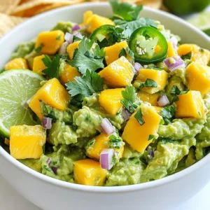To make spicy mango guacamole, you need fresh and vibrant ingredients. Here is what you will need: - 2 ripe avocados, halved and pitted - 1 ripe mango, peeled and diced into small cubes - 1 small red onion, finely minced - 1 jalapeño pepper, deseeded and finely minced - 2 tablespoons freshly squeezed lime juice - ¼ cup fresh cilantro leaves, roughly chopped - Sea salt and freshly cracked black pepper, to taste - ½ teaspoon ground cumin (optional, but recommended for added depth) - Crisp tortilla chips, for delightful dipping These ingredients each play a key role in the flavor of the guacamole. The avocados provide creaminess, while the mango adds sweetness. The red onion and jalapeño give it a nice crunch and heat. Lime juice brightens the flavors, and cilantro adds freshness. Adjust the salt and cumin for extra flavor. If you want to make this dish your own, try adding other ingredients you love. Remember, the key is to work with fresh items. Your guacamole will shine with vibrant flavors and colors! {{ingredient_image_2}} First, take two ripe avocados. Cut them in half and remove the pits. Use a spoon to scoop out the creamy green flesh. Place the avocado flesh into a medium mixing bowl. Now, let's talk about mashing. I like to mash until it's somewhat smooth but leave some chunks. This gives the guacamole a nice texture. If you prefer it creamier, mash more until it suits your taste. Next, add the diced mango to the mashed avocado. The sweet mango elevates the dish. Then, mix in the finely minced red onion and jalapeño. The onion adds crunch, while the jalapeño brings the heat. After that, drizzle in two tablespoons of freshly squeezed lime juice. This brightens up the flavors. Now, sprinkle sea salt, black pepper, and optional ground cumin for depth. The cumin adds a warm, earthy note to the mix. Use a spatula to gently fold everything together. Make sure to keep that chunky texture. This makes each bite exciting! Now, it’s time for taste adjustments. Try a small spoonful. If it needs more zing, add a dash of lime juice. A sprinkle of salt can also enhance the flavors. Taste again and adjust as needed. Serve your guacamole right away with crisp tortilla chips for dipping. If you won't serve it immediately, cover it tightly. This keeps it fresh and prevents browning. Enjoy your spicy mango guacamole! To manage the heat from jalapeños, you can remove the seeds. The seeds hold most of the spice. If you want a milder guacamole, use less jalapeño or skip it altogether. You can also try a sweet bell pepper for a nice crunch without the heat. Adding spices can take your guacamole to the next level. Try a pinch of smoked paprika for warmth or some garlic powder for depth. Balancing sweetness and acidity is key. The mango brings sweetness, while lime juice gives that needed tang. Adjust these flavors to your taste. Presentation matters! Serve your guacamole in a bright bowl to grab attention. Top it with fresh cilantro for a pop of green. Add lime wedges on the side for extra flair and color. This makes it look fresh and inviting, perfect for parties or casual snacking. Pro Tips Choose Ripe Avocados: Ensure your avocados are perfectly ripe for the creamiest guacamole. They should yield slightly to gentle pressure when squeezed. Adjust the Heat: If you prefer a milder guacamole, remove the seeds and membranes from the jalapeño. For more heat, leave some seeds in or add a pinch of cayenne pepper. Fresh Lime Juice: Always use fresh lime juice instead of bottled for the best flavor. It brightens the guacamole and enhances the overall taste. Storage Tips: If you need to store leftover guacamole, press plastic wrap directly onto the surface to minimize oxidation and browning. {{image_4}} You can bring a tropical vibe to your spicy mango guacamole by adding pineapple. Fresh pineapple adds a sweet and tangy flavor that pairs well with mango. You can also try adding diced papaya or kiwi. These fruits enhance the taste and give a fun twist to your dish. Just chop them into small pieces and mix them in like you do with mango. Want to kick up the heat? Swap the jalapeño for a serrano or habanero pepper. Serrano peppers are slightly hotter, and habaneros pack a punch. If you want less spice, use a milder bell pepper. Just remember to chop them finely so they blend well with the other ingredients. Always taste before adding more, as it's easy to go overboard. This guacamole is naturally vegan and gluten-free. If you're low-carb, enjoy it as is. You can pair it with veggies like cucumber or bell pepper slices instead of chips. For a nutty flavor, try adding a sprinkle of roasted pumpkin seeds. These adjustments keep the dish tasty while meeting your dietary needs. To keep your spicy mango guacamole fresh, use these tips: - Use airtight containers. Glass or plastic containers with lids work best. - Press plastic wrap directly on the guacamole. This helps reduce air exposure. - Add lime juice. The acid slows browning. - Store in the fridge. Ideal temperatures are between 32°F and 40°F. These methods help maintain the vibrant colors and flavors of your guacamole. Guacamole is best fresh, but you can refresh leftovers. - Stir it up. Mix well to redistribute flavors. - Add more lime juice. This brightens the taste and helps with browning. - Check for spoilage. If it smells off or has brown spots, toss it. Generally, guacamole lasts about 2-3 days in the fridge. Always taste it before serving to ensure quality. Spicy Mango Guacamole stays fresh for about 1 to 2 days in the fridge. To keep it longer, store it in an airtight container. Press plastic wrap directly onto the guacamole's surface to limit air exposure. This helps reduce browning. You can make guacamole ahead of time. Just follow a few tips. Prepare it up to 24 hours in advance. Use lime juice to help keep it fresh. Store it in an airtight container. Cover the top with plastic wrap to avoid air contact. Spicy Mango Guacamole pairs well with various snacks. Serve it with crisp tortilla chips for dipping. Fresh veggies like carrots and cucumbers also work great. Try it with grilled chicken or fish for a tasty meal. You can also add it to tacos for extra flavor. You learned how to make Spicy Mango Guacamole, from fresh ingredients to final touches. Adjust the spice and customize flavors to fit your taste. Remember to store it right for the best freshness. This guacamole is easy, fun, and perfect for sharing. Enjoy this tasty dish at your next gathering or snack time. Your friends will love the flavors, and it will impress everyone. Keep experimenting with variations to make your own unique version. Now, grab your ingredients and start making this delicious dip!