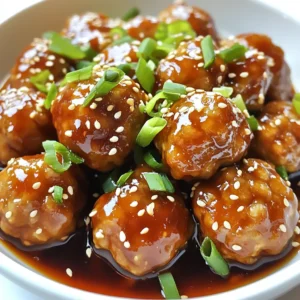 - 1 pound ground chicken - ½ cup breadcrumbs (panko recommended) - ¼ cup green onions, finely chopped - 2 cloves garlic, minced - 1 teaspoon fresh ginger, grated - 1 large egg, lightly beaten - 1 tablespoon soy sauce (low sodium if preferred) - Salt and pepper, to taste - 1 tablespoon sesame oil I love using ground chicken for these meatballs. It keeps them light and tender. Panko breadcrumbs give a nice crunch, which makes the meatballs even better. Green onions add a fresh flavor and a pop of color. Garlic and ginger bring warmth and depth to the dish. - ½ cup soy sauce (low sodium recommended) - ¼ cup honey (or maple syrup for a vegan option) - ¼ cup rice vinegar - 2 tablespoons cornstarch - ¼ cup water - 1 teaspoon sesame seeds (for garnish) - Additional sliced green onions (for garnish) The teriyaki sauce is the star here. It balances sweet and salty, making it perfect for the meatballs. Honey or maple syrup adds a touch of sweetness, while rice vinegar gives a slight tang. Cornstarch helps the sauce thicken nicely, coating each meatball. This combination of ingredients ensures a delicious meal. The flavors blend well, creating a dish that everyone will love. {{ingredient_image_2}} - Preheat the oven to 400°F (200°C). This helps the meatballs cook evenly. - In a large mixing bowl, combine: - 1 pound ground chicken - ½ cup breadcrumbs (panko for crunch) - ¼ cup finely chopped green onions - 1 large egg, lightly beaten - 2 cloves garlic, minced - 1 teaspoon fresh ginger, grated - 1 tablespoon soy sauce - Salt and pepper, to taste - Mix gently until all ingredients blend. Be careful not to overmix. This keeps the meatballs tender. - Shape the mixture into small meatballs, about 1 inch in diameter. Use your hands for this. - Arrange the meatballs on a baking sheet lined with parchment paper. Leave space between each to cook well. - Drizzle the meatballs with 1 tablespoon of sesame oil. This adds flavor and helps them brown. - Bake for 18-20 minutes. They should be firm and golden brown when done. - In a small saucepan, combine: - ½ cup soy sauce - ¼ cup honey (or maple syrup) - ¼ cup rice vinegar - 2 tablespoons cornstarch - ¼ cup water - Whisk the mixture well. Heat it over medium heat and stir until it thickens, about 3-5 minutes. - Once thickened, remove it from heat and let it cool slightly. - When the meatballs are ready, transfer them to a large bowl. Pour the teriyaki sauce over them. - Toss gently to coat each meatball evenly in the sauce. - For a great look, serve the meatballs on a platter. Garnish with sesame seeds and more sliced green onions. - Avoid overmixing: Mix gently when combining the meat and other ingredients. Overmixing can make your meatballs tough. You want them tender and juicy. - Ensuring even cooking: Space the meatballs on the baking sheet. This helps them cook evenly. If they are too close, they may steam instead of brown. - Ideal meatball size: Keep your meatballs about 1 inch in diameter. This size cooks well and stays moist inside. Larger meatballs may take longer to cook through. - Importance of sesame oil: Sesame oil adds a nutty flavor that complements teriyaki sauce. Drizzle it over the meatballs before baking for more taste. - Additional seasoning ideas: Consider adding a pinch of red pepper flakes for heat. Chopped cilantro or fresh herbs can also brighten the dish. Feel free to experiment! - Baking vs. frying options: Baking is easy and less messy. However, frying gives a crispier exterior. Choose what works best for you. - Substitutions for dietary preferences: You can use ground turkey or even plant-based meat. For gluten-free options, use gluten-free breadcrumbs and soy sauce. Adjust to fit your needs! Pro Tips Use Panko Breadcrumbs: For an extra crunchy texture, opt for panko breadcrumbs instead of regular ones. Don’t Overmix: Combine the meatball ingredients gently to avoid tough meatballs; overmixing can lead to a dense texture. Adjust Sweetness: Feel free to adjust the sweetness of the teriyaki sauce by adding more honey or maple syrup based on your taste preference. Garnish for Color: Enhance presentation by adding colorful garnishes like sliced green onions and sesame seeds just before serving. {{image_4}} You can switch up the meat to make different meatballs. Ground turkey works great. It has a mild flavor and is leaner than chicken. You can follow the same steps in the recipe, and the result will be just as tasty. If you want a plant-based option, use lentils or chickpeas. Mash them up and mix with breadcrumbs and seasonings. This way, you keep the same texture and taste while making it vegan. If you like heat, try a spicy teriyaki sauce. Add a bit of sriracha or red pepper flakes. This will give your meatballs a nice kick. You can also add some garlic powder or onion powder for extra flavor. You can experiment with different herbs and spices. Fresh cilantro or basil can brighten the dish. Even a sprinkle of five-spice powder can add a unique twist. Don’t be afraid to play with flavors. Serve your meatballs over rice or quinoa for a filling meal. Both options soak up the teriyaki sauce well. If you want more nutrition, choose quinoa. Add steamed vegetables like broccoli or snap peas on the side. This adds color and crunch to your plate. It makes the meal look great and taste fresh. To keep your sweet teriyaki meatballs fresh, store them in the fridge. Place them in an airtight container. They will last about 3 to 4 days. For longer storage, freeze the meatballs. Use a freezer-safe container or bag. They can stay good for up to 3 months. When you want to eat them, just thaw them in the fridge overnight. For the best taste, reheat your meatballs in the oven. Preheat it to 350°F (175°C). Place the meatballs on a baking sheet. Heat them for 15 to 20 minutes. You can also use a microwave. Heat them in short bursts of 30 seconds. Check often to avoid overcooking. This helps keep the meatballs juicy and tasty. Adding a splash of water before heating helps too. This keeps them from drying out. Enjoy your flavorful meal! To make teriyaki meatballs spicy, you can add a few ingredients. Try using chili flakes for heat. You can also mix in some Sriracha or hot sauce. For a different kick, add diced jalapeños to the meatball mixture. These spices will bring more heat without losing flavor. Yes, you can use other sauces. Hoisin sauce can work well for a sweet and tangy twist. You might also try a sweet soy glaze. Each sauce will change the flavor a bit. Hoisin gives a richer taste, while sweet soy glaze adds sweetness without being too thick. Sweet teriyaki meatballs last about three to four days in the fridge. Make sure to store them in an airtight container. To keep them fresh, let them cool before sealing. If you want them to last longer, you can freeze them for up to three months. There are many great sides for sweet teriyaki meatballs. Rice or quinoa makes an excellent base. You can also serve stir-fried vegetables, like broccoli or snap peas. For a fun twist, try making lettuce wraps. They add a crisp flavor that pairs well with the meatballs. Sweet teriyaki meatballs combine simple ingredients for a delicious dish. From chicken and breadcrumbs to a flavorful sauce, each step builds tasty results. You can tweak the recipe for different proteins or spice levels, making it fun. Keep leftovers fresh and enjoy meal prep! With these tips, serving is easy and enjoyable. Now, it's time for you to try this recipe and impress your friends and family. Enjoy the cooking process and the delicious taste of your meatballs!