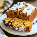 - 1 cup canned pumpkin puree - ½ cup packed brown sugar - ½ cup granulated sugar - ⅓ cup vegetable oil - 2 large eggs - 1 ½ cups all-purpose flour - 1 teaspoon baking powder - ½ teaspoon baking soda - ½ teaspoon salt - 1 teaspoon ground cinnamon - ½ teaspoon ground nutmeg - ½ teaspoon vanilla extract - 1 cup semi-sweet chocolate chips - ½ cup finely chopped walnuts (optional) You can swap canned pumpkin with homemade pumpkin puree. It works well and keeps the flavor rich. If you want less sugar, use applesauce instead of brown sugar. It adds moisture and sweetness. For oil, you can use melted coconut oil. This gives a nice taste. If you need a gluten-free option, try almond flour in place of all-purpose flour. To make your bread even better, try adding ½ cup of dried cranberries or raisins. They add a sweet and tangy kick. You can also mix in 1 teaspoon of pumpkin spice. This will boost the fall flavor. For a nutty twist, add pecans or hazelnuts instead of walnuts. Each of these add-ins brings a unique taste and texture to your pumpkin bread. {{ingredient_image_2}} First, preheat your oven to 350°F (175°C). While it heats, grab a 9x5-inch loaf pan. Coat it well with cooking spray or softened butter. This step helps the bread slide out smoothly once baked. In a large mixing bowl, combine 1 cup of canned pumpkin puree, ½ cup of packed brown sugar, and ½ cup of granulated sugar. Pour in ⅓ cup of vegetable oil. Mix these ingredients together using an electric mixer or a whisk. Keep mixing until the mixture is smooth and creamy. Next, add in 2 large eggs, one at a time. Beat well after each egg. Finally, stir in ½ teaspoon of vanilla extract for a lovely flavor. In a second bowl, sift together 1 ½ cups of all-purpose flour, 1 teaspoon of baking powder, ½ teaspoon of baking soda, and ½ teaspoon of salt. Add 1 teaspoon of ground cinnamon and ½ teaspoon of ground nutmeg. Whisk these dry ingredients well. This will help mix the spices evenly throughout the bread. Now, gently add the dry mixture into the wet pumpkin mix. Use a spatula or wooden spoon to stir. Mix just until combined. Be careful not to overmix, as this can make the bread dense. Once combined, gently fold in 1 cup of semi-sweet chocolate chips. If you like, add ½ cup of finely chopped walnuts for extra crunch. Pour the batter into your prepared loaf pan. Smooth the top with a spatula. Place the pan in your preheated oven and bake for 55 to 60 minutes. To check if it’s done, insert a toothpick into the center. If it comes out clean, your bread is ready! Once baked, take the pan out and let the bread cool for 10 minutes. Carefully remove the bread from the pan and place it on a wire rack. Let it cool completely. When serving, slice the bread and consider dusting it with powdered sugar. You can pair it with whipped cream or vanilla ice cream for a treat! To get soft and moist chocolate chip pumpkin bread, keep these tips in mind: - Measure accurately: Use a kitchen scale for precise measurements. Too much flour can make the bread dry. - Don’t overmix: Stir the wet and dry ingredients until just combined. Overmixing can lead to a tough texture. - Use fresh ingredients: Ensure your baking powder and baking soda are fresh. Old leavening agents can affect the rise. Here are some common pitfalls to watch for: - Skipping the sifting step: Always sift your dry ingredients to avoid clumps. This helps the bread rise better. - Not prepping the pan: Grease your loaf pan well. A well-prepared pan helps the bread release easily. - Opening the oven door: Avoid checking the bread too often while it bakes. This can cause it to sink. Having the right tools makes the process smoother: - Loaf pan: A 9x5-inch pan works best for this recipe. - Mixing bowls: Use large, sturdy bowls for mixing wet and dry ingredients. - Electric mixer: While a whisk works, an electric mixer makes blending easier. - Measuring cups and spoons: Accurate measurements ensure the best results. - Cooling rack: A rack allows the bread to cool evenly, preventing sogginess. These tips will help you bake a perfect chocolate chip pumpkin bread every time! Pro Tips Use Fresh Spices: Freshly ground spices can elevate the flavor of your bread. Consider using whole nutmeg and grinding it just before use for a more aromatic experience. Don’t Overmix: Mix just until the dry ingredients are incorporated to avoid a dense loaf. A few lumps in the batter are perfectly fine! Check for Doneness: Baking times can vary based on your oven. Always use the toothpick test to check if the center is baked through; it should come out clean or with a few moist crumbs. Storage Tips: Store leftover bread in an airtight container at room temperature for a few days, or wrap it tightly and freeze for up to three months. {{image_4}} You can make this bread gluten-free by using a gluten-free flour blend. Look for a mix that has xanthan gum already added. Replace the all-purpose flour with the gluten-free blend in equal amounts. This swap keeps the texture light and fluffy. Your friends and family won’t even know the difference! To make this recipe vegan, swap the eggs for flaxseed meal or applesauce. Use 1 tablespoon of flaxseed mixed with 3 tablespoons of water for each egg. Let this sit for a few minutes to thicken. For the oil, use a plant-based option like coconut oil or applesauce. These changes keep the bread moist and tasty. You can get creative with flavors! Try adding: - Spices: Mix in a pinch of ginger or cloves for warmth. - Chocolate types: Use dark chocolate chips for a richer taste. - Nuts: Add pecans or almonds for a crunchy texture. These simple tweaks can make your pumpkin bread unique and fun each time you bake! To keep your chocolate chip pumpkin bread fresh, store it in an airtight container. Place a layer of plastic wrap directly on the bread. This keeps moisture in and prevents it from drying out. You can also wrap it in foil for extra protection. Store it at room temperature for up to three days. If you want it to last longer, consider freezing. Freezing your chocolate chip pumpkin bread is easy. First, let the bread cool completely. Then, slice the bread into individual pieces. Wrap each slice tightly in plastic wrap. After that, place all the wrapped slices in a freezer-safe bag. You can freeze the bread for up to three months. When you're ready to enjoy it, simply thaw it in the fridge overnight. To reheat day-old chocolate chip pumpkin bread, preheat your oven to 350°F (175°C). Place the slices on a baking sheet. Heat them for about 10-15 minutes. This will warm the bread and bring back its soft texture. If you want a quick option, you can microwave a slice for 15-20 seconds. Just be careful not to overheat, or it may become tough. Enjoy your delicious bread warm! Yes, you can use fresh pumpkin. Just cook and puree the pumpkin first. It will add a bright flavor. You need about one cup of pureed fresh pumpkin to replace the canned pumpkin. To check if the bread is done, use a toothpick. Insert it into the center of the bread. If it comes out clean, the bread is ready. It takes about 55 to 60 minutes to bake. Keep an eye on it towards the end. You can serve the bread with many tasty options. A dollop of whipped cream adds fluffiness. Vanilla ice cream pairs well too. You can also enjoy it with coffee or tea for a cozy treat. Chocolate chip pumpkin bread stays fresh for about 3 to 4 days at room temperature. Store it in an airtight container. If you want it to last longer, freeze it. It can last up to three months in the freezer. This blog post covered everything you need for chocolate chip pumpkin bread. We explored key ingredients, step-by-step instructions, and useful tips. You learned about variations and how to store your bread properly. Remember, learning to bake is fun and rewarding. Use these tips to create delicious bread that suits your taste. Enjoy every bite, and share it with friends and family. Happy baking!