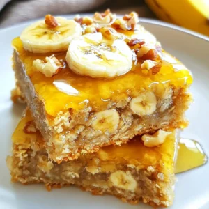 - 2 ripe bananas, thoroughly mashed - 1 cup rolled oats - ½ cup almond butter (or any nut butter of your choice) - ¼ cup honey or maple syrup - ½ teaspoon pure vanilla extract - ½ teaspoon ground cinnamon - ¼ teaspoon sea salt - ¼ cup dark chocolate chips - ¼ cup of your favorite chopped nuts or seeds (such as walnuts or chia seeds) These ingredients create a simple yet tasty snack. The ripe bananas add natural sweetness. Their soft texture mixes well with oats and nut butter, giving these bars a chewy feel. Rolled oats bring fiber, making these bars filling. Almond butter, or any nut butter, gives healthy fats and protein. Honey or maple syrup adds sweetness and binds the bars together. Pure vanilla extract enhances the flavor, making every bite enjoyable. Optional add-ins let you customize your bars. Ground cinnamon adds warmth and spice. A bit of sea salt balances the sweetness. Dark chocolate chips can make the snack feel like a treat. Nuts or seeds add crunch and extra nutrients. These bars are great for breakfast or an afternoon snack. You can even share them with friends. Enjoy creating your own version! {{ingredient_image_2}} - Preheat the Oven: Start by setting your oven to 350°F (175°C). This step warms the oven for even baking. - Line an 8x8 inch baking pan: Grab your 8x8 inch pan and line it with parchment paper. Let the paper hang over the sides. This helps you lift the bars out easily later. - Combine Wet Ingredients: In a large bowl, mash 2 ripe bananas well. Add ½ cup almond butter, ¼ cup honey (or maple syrup), and ½ teaspoon vanilla extract. Mix until smooth and combined. - Incorporate Dry Ingredients: Now, add 1 cup rolled oats, ½ teaspoon ground cinnamon, and ¼ teaspoon sea salt to the bowl. Stir well. If you like, fold in ¼ cup dark chocolate chips and ¼ cup chopped nuts or seeds for extra flavor. - Pour Mixture into the Pan: Pour the mixture into your prepared baking pan. Use a spatula to spread it out evenly and flatten the top. - Bake to Perfection: Place the pan in the oven. Bake for 20-25 minutes. You know the bars are done when the edges turn golden brown. Test with a toothpick; it should come out clean. - Cool Before Cutting: After baking, take the pan out and let it cool for about 10 minutes. Then, lift the bars out using the parchment paper and place them on a wire rack to cool completely. - Slice and Serve: Once cooled, cut the bars into squares or rectangles. They are ready to enjoy as a snack! - Presentation Tips: For a nice touch, stack the bars on a pretty plate. Drizzle some honey on top, and add banana slices or a sprinkle of nuts for garnish. - Choosing Ripe Bananas: Use bananas with brown spots. They are sweeter and softer. The more ripe they are, the better your bars will taste. - Adjusting Baking Time: Keep an eye on your bars. Bake them until the edges turn golden brown. A toothpick should come out clean from the center. - Adding Spices: Try adding a pinch of nutmeg or ginger. They can give your bars a nice kick. Ground cinnamon is a classic choice that works well, too. - Incorporating Nut Butters: Almond butter is great, but feel free to use peanut butter or cashew butter. Each nut butter adds its own unique flavor to the bars. - Drizzling Options: You can drizzle honey or maple syrup on top for extra sweetness. A chocolate drizzle also makes them look fancy. - Garnishing Suggestions: Add banana slices, chopped nuts, or seeds as a garnish. This not only looks good but adds texture, too. Pro Tips Use Overripe Bananas: The riper the bananas, the sweeter and more flavorful your bars will be. Look for bananas with plenty of brown spots for the best results. Nut Butter Variations: Feel free to experiment with different nut butters like cashew or peanut butter to customize the flavor of your bars. Chilling for Firmness: For firmer bars, refrigerate the cut pieces for an hour before serving. This will help them hold their shape better. Customize Add-Ins: Get creative by adding dried fruits, seeds, or spices to the mixture for extra texture and flavor. Think raisins, cranberries, or even a pinch of nutmeg! {{image_4}} - Use sunflower seed butter instead of almond butter. This keeps the bars creamy. - You can also omit all nuts entirely. The bars will still taste great and stay healthy. - For gluten-free bars, choose certified gluten-free oats. This keeps the recipe safe for everyone. - If you want a vegan option, use maple syrup instead of honey. This keeps it plant-based. - You can add different fruits like blueberries or diced apples. This adds new flavors and textures. - Try using other extracts, like almond or coconut. These can enhance the taste of your bars. Store your banana oatmeal bars at room temperature for a quick snack. Keep them in an airtight container to maintain freshness. If it’s hot, put them in the fridge. Refrigeration helps prevent spoilage. To freeze the bars, cut them into squares first. Wrap each bar in plastic wrap. Then, place them in a freezer-safe bag. This helps keep them fresh for a longer time. When you want to eat one, take it out and let it thaw on the counter for about 30 minutes. You can also microwave it for a few seconds. Banana oatmeal bars last about a week at room temperature. In the fridge, they can last up to two weeks. If you freeze them, they can last for three months. Look for signs of spoilage like a change in smell or color. If they feel mushy or have mold, it’s best to toss them. Banana oatmeal bars are a tasty snack made mainly from ripe bananas and oats. They are chewy and sweet, perfect for a quick bite. These bars are easy to make and use simple ingredients. You can enjoy them for breakfast, as a snack, or even dessert. Yes, you can swap almond butter for other nut butters. Peanut butter works well and gives a nice flavor. Sunflower seed butter is a good choice too if you want a nut-free option. Any creamy nut butter will mix well with the bananas and oats. Yes, these bars are a healthy choice! They contain whole grains from oats and natural sweetness from bananas. Almond butter adds healthy fats and protein. Dark chocolate chips can add a bit of fun without too much guilt. Each bar gives you energy and satisfies your hunger. To lower the sugar, reduce the honey or maple syrup. You can also try using mashed bananas to sweeten more. If you are using chocolate chips, pick a lower-sugar option or skip them. Adding spices like cinnamon can also enhance flavor without extra sugar. Absolutely! You can mix in protein powder for an extra boost. Adding seeds like chia or hemp seeds also increases protein content. Mixing nuts into the batter can add crunch and protein too. This way, you make your bars even more filling and nutritious. These banana oatmeal bars are simple and tasty. You start with ripe bananas and oats. Then, mix in almond butter and sweeteners. Optional add-ins like chocolate chips add fun flavor. With tips on texture and flavor, you can tailor these bars to your liking. Store them well and freeze extras for later. Enjoy making these easy snacks, and feel free to get creative with the ingredients!