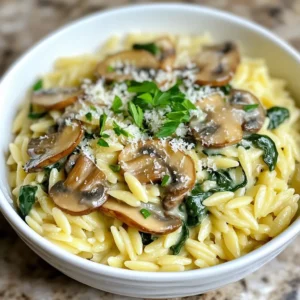 - 1 cup orzo pasta - 2 tablespoons olive oil - 1 medium onion, finely chopped - 2 cloves garlic, minced - 8 oz (225g) mushrooms, sliced (any variety) - 4 cups fresh spinach - 1 cup vegetable broth - 1 cup heavy cream (or a plant-based alternative) - ½ cup grated Parmesan cheese (or nutritional yeast for a vegan option) - Salt and pepper to taste - Fresh parsley, chopped (for garnish) You can swap orzo with any small pasta like farro or couscous. If you want a lighter dish, use a plant-based cream like cashew or almond. For mushrooms, try a mix of shiitake and portobello for a richer taste. Use nutritional yeast instead of Parmesan for a vegan option. Always pick fresh spinach and mushrooms. They should look vibrant and firm. The olive oil should be extra virgin for the best flavor. Use freshly grated Parmesan for a creamier sauce. This small detail adds depth to your dish. {{ingredient_image_2}} To start, fill a large pot with water and add a pinch of salt. Bring it to a boil. Once the water is bubbling, add 1 cup of orzo pasta. Cook it for about 8-10 minutes. Stir occasionally to keep it from sticking. The goal is for it to be al dente. After cooking, drain the pasta and set it aside. Now, grab a large skillet and pour in 2 tablespoons of olive oil. Heat it over medium heat. Add 1 medium onion, finely chopped. Saut&eacute; it for about 3-4 minutes. Stir it gently until it turns translucent. Next, add 2 cloves of minced garlic and cook for another minute. The aroma will be amazing! Next, toss in 8 ounces of sliced mushrooms. Cook them for about 5-7 minutes. Stir occasionally until they turn golden brown. This step is key for flavor. Now, add 4 cups of fresh spinach. Stir for 2-3 minutes until it wilts down. Then, pour in 1 cup of vegetable broth and 1 cup of heavy cream. Turn the heat up slightly and let it simmer. Mix in ½ cup of grated Parmesan cheese. Keep stirring until it melts into a creamy sauce. Season with salt and pepper to taste. It's time to bring it all together! Add the drained orzo to the skillet. Mix everything thoroughly so the pasta is coated in the creamy sauce. Let it cook on low heat for another 2-3 minutes. This helps the flavors blend. Once done, remove it from heat and garnish with chopped parsley. Serve it hot and enjoy this tasty dish! When you cook orzo, always use plenty of water. This helps the pasta move freely. Add salt to the water for flavor. Stir the orzo gently as it cooks. This keeps it from sticking together. Follow the package instructions for the best results. To prevent sticky orzo, drain it well after cooking. Rinse it briefly under cool water. This removes excess starch and keeps it from clumping. Toss the orzo with a little olive oil. This adds flavor and helps separate the pasta. To make a creamy sauce, start with fresh ingredients. Use high-quality heavy cream or a plant-based alternative. Add cheese gradually, stirring continuously. This helps the cheese melt smoothly. Keep the heat low to avoid burning. Adjust salt and pepper to taste for a balanced flavor. Pro Tips Choose the Right Mushrooms: Different mushroom varieties can change the flavor profile of your dish. For a more robust taste, consider using shiitake or portobello mushrooms. Perfectly Cooked Orzo: Make sure to cook the orzo al dente for the best texture. It will continue to absorb sauce as it sits, so avoid overcooking. Customize Your Greens: Feel free to mix in other greens like kale or Swiss chard for added nutrients and variety. Just adjust the cooking time as needed. Make it Vegan: For a plant-based version, substitute heavy cream with coconut cream or a cashew cream for a rich, creamy texture without dairy. {{image_4}} You can easily make this dish vegan. Simply swap the heavy cream for a plant-based cream. Nutritional yeast works well instead of Parmesan cheese. This gives you a cheesy flavor without dairy. You can add protein to make this meal heartier. Grilled chicken or shrimp pairs nicely with the creamy sauce. Cook the protein separately and mix it in when you combine the orzo. This adds flavor and makes the dish more filling. Feel free to mix in other veggies. Asparagus and peas add a fresh taste. You can also try broccoli or bell peppers for a colorful twist. Just saut&eacute; them along with the mushrooms for a tasty mix. To store your creamy mushroom spinach orzo, let it cool first. Place it in an airtight container. This helps keep it fresh. Store it in the fridge for up to three days. If you want to keep it longer, consider freezing it. When you&rsquo;re ready to eat your leftovers, reheat them gently. You can use a microwave or a stovetop. If using a microwave, heat in short bursts. Stir in between to ensure even heating. On the stovetop, add a splash of broth or cream to keep it creamy. Stir often until it warms up. To freeze the orzo, first cool it completely. Then, place it in a freezer-safe bag or container. Make sure to remove as much air as possible. Label it with the date. You can freeze it for up to three months. When ready to enjoy, thaw it overnight in the fridge. Reheat as mentioned before to keep it creamy. Yes, you can use different types of pasta. Penne or farfalle work great. Just adjust the cooking time based on the pasta you choose. Keep an eye on it to avoid overcooking. To make this dish gluten-free, use gluten-free orzo. Many brands offer tasty options. Check the package for cooking times, as they may vary. Ensure your vegetable broth is also gluten-free. Creamy Mushroom Spinach Orzo pairs well with many sides. You can serve it with a fresh green salad or garlic bread. Grilled chicken or shrimp also makes a great addition for protein lovers. This blog post covered how to make Creamy Mushroom Spinach Orzo. We looked at ingredients, including fresh options and swaps. You learned step-by-step instructions, from cooking orzo to making the sauce. I shared helpful tips to avoid sticky pasta and achieve creamy perfection. We explored variations to fit diets and added proteins. Lastly, I explained how to store and reheat leftovers. Now, you have the tools to make this dish your own. Enjoy creating a tasty meal!